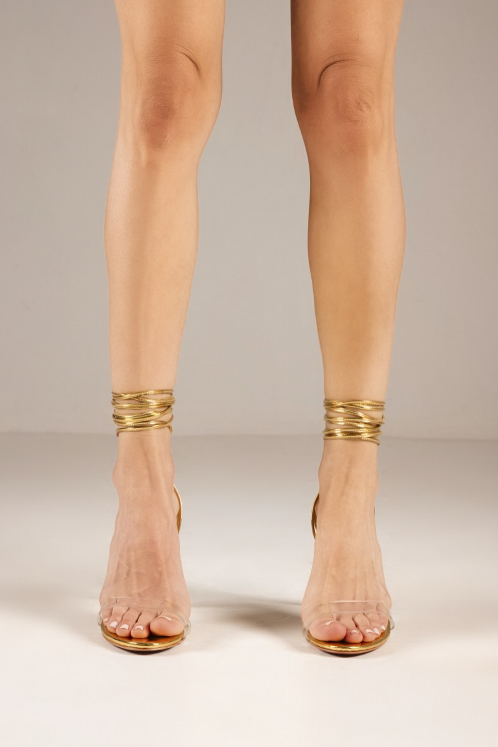 ÉXI-MAEVE SCHNÜRER GOLD